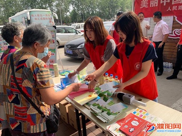 人民办志愿者开展“美丽中国——我是行动者”世界环境日宣传活动‘mile米乐m6’